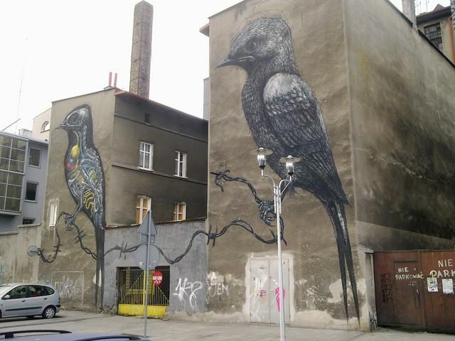 Mural by Belgian artist ROA in Mariacka Tylna street