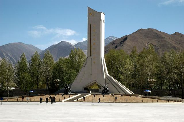 The Monument to the Peaceful Liberation of Tibet in Lhasa, a heavily guarded memorial to the 1950 invasion