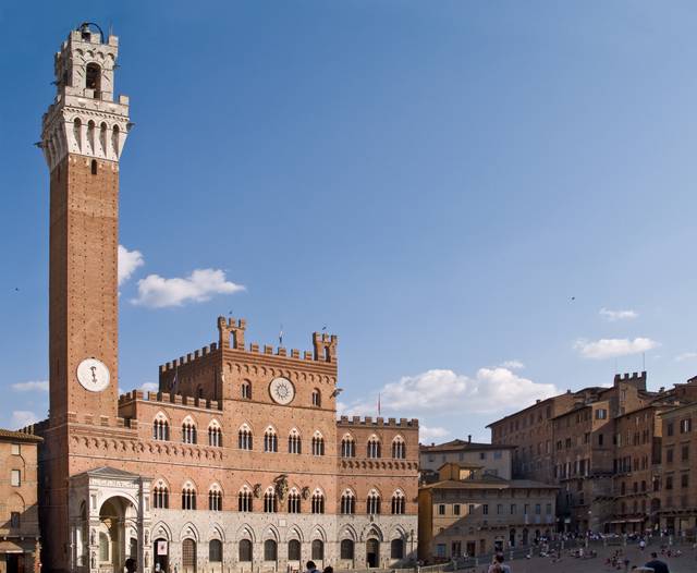 The Palazzo Pubblico, with its tower, the Torre del Mangia, majestically dominating the Piazza del Campo