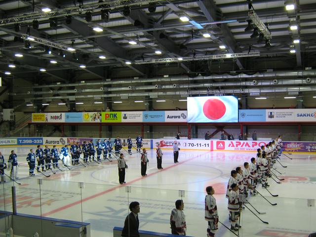 PSK Sakhalin and the Japanese team Ozi Eagles listening to the Japanese national anthem before a game.