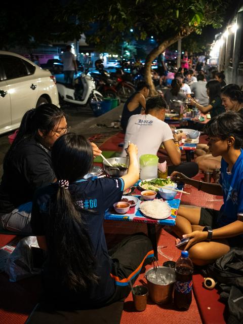 A Thai suki street food restaurant on a side walk in Korat