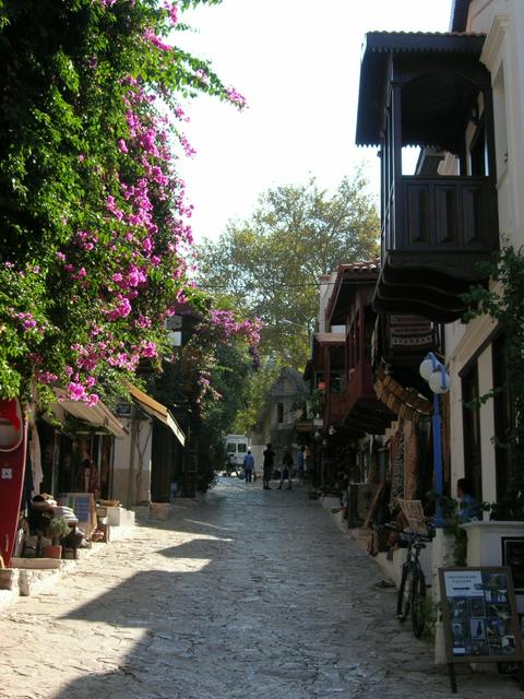 A street in Kaş. Note the Lycian sarcophagus at the background