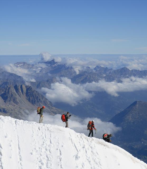 Mountaineers leaving the upper station of the Aiguille du Midi