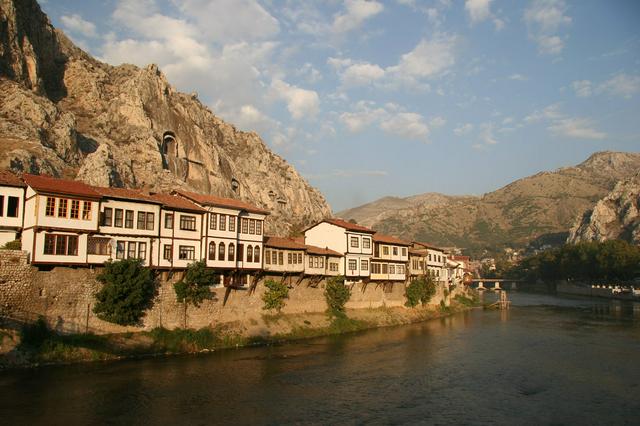 Traditional riverside houses of Amasya, backed by ancient rock tombs