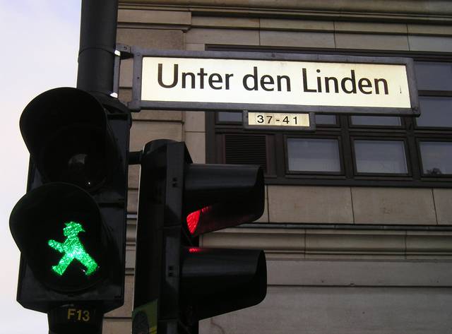 Street name with the range of house numbers; notice also the East Berlin Ampelmännchen