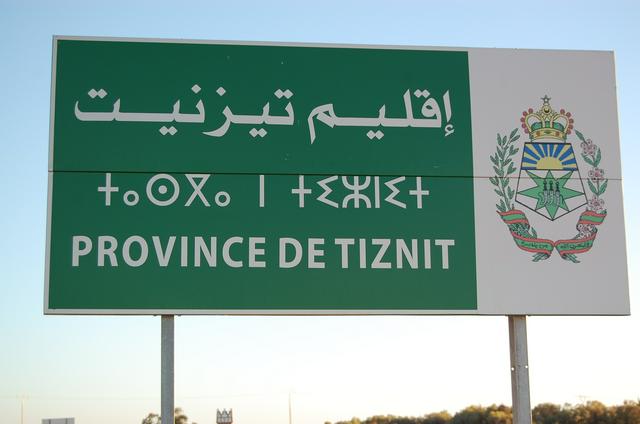 Road sign in Arabic, Berber and French