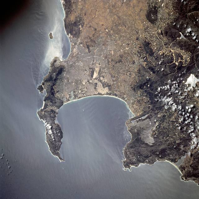 Cape Town seen from space: Most of the urban area visible in this NASA Astronaut photo is part of the greater Cape Town metropolitan area. Also visible are Stellenbosch, Paarl, and Fransch Hoek to the northeast, and Rooi-els and Pringle Bay to the southeast