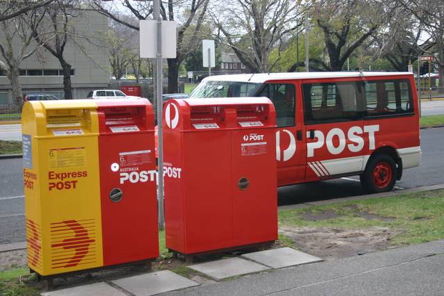 Express (yellow) and normal (red) Australia Post street posting boxes