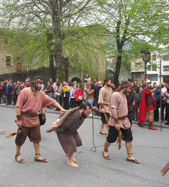 Procession of the Passion play on Good Friday, past the Old Bridge.