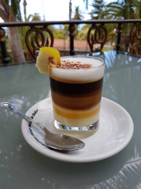 A barraquito, local coffee based on condensed milk and espresso