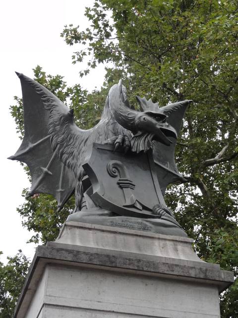 A Basilisk, the mythical dragon holding the coat of arms and protecting the city