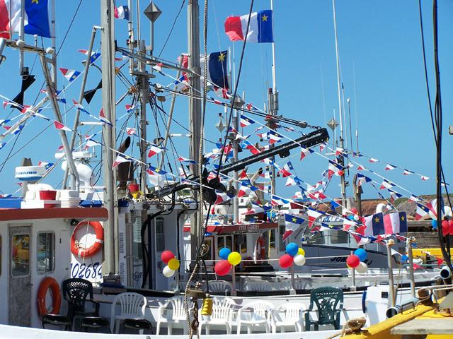 Boats decorated in Acadian colours