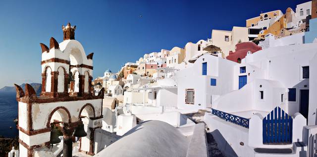 Bells of the Blue domed Church (dedicated to St. Spirou) in Firostefani, Santorini island (Thira), Greece