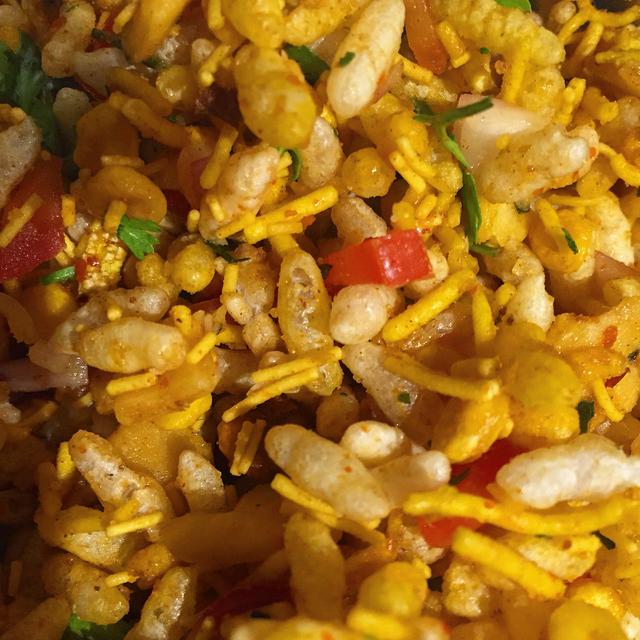 Bhelpuri is made of puffed rice, vegetables and a tangy tamarind sauce.