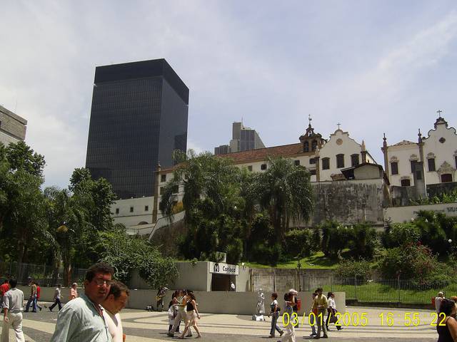 Colonial buildings next to modern skyscraper in downtown Rio.