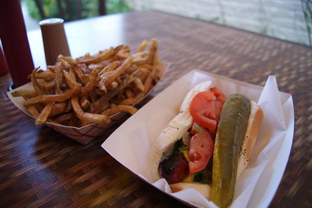 A Chicago-style hot dog with duck-fat fries.