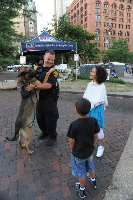 A Cleveland police officer with his partner.
