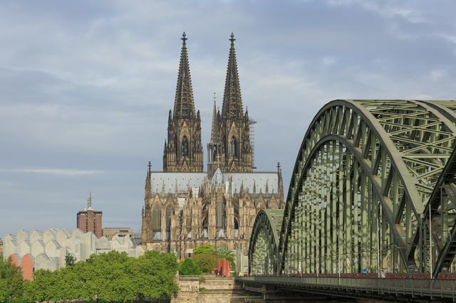 The Dom (cathedral) and Hochenzollernbrücke (railway bridge) are two of the most recognizable landmarks of Cologne