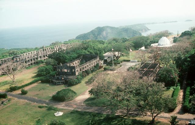 Aerial view of the ruins and a memorial to American and Filipino defenders of the island during World War II