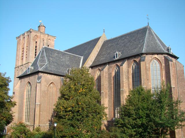 Saint-Nicolas/Great Church with its iconic flat-top tower.