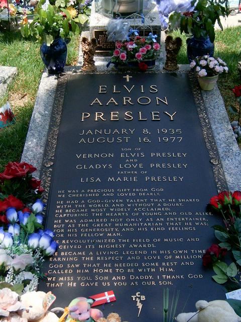 Elvis' final resting place at Graceland. His middle name was usually spelled with just one "A", but legally had two