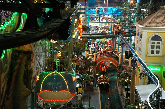 The dimly lit, surreal kitsch of the First World Plaza indoor theme park-cum-shopping mall