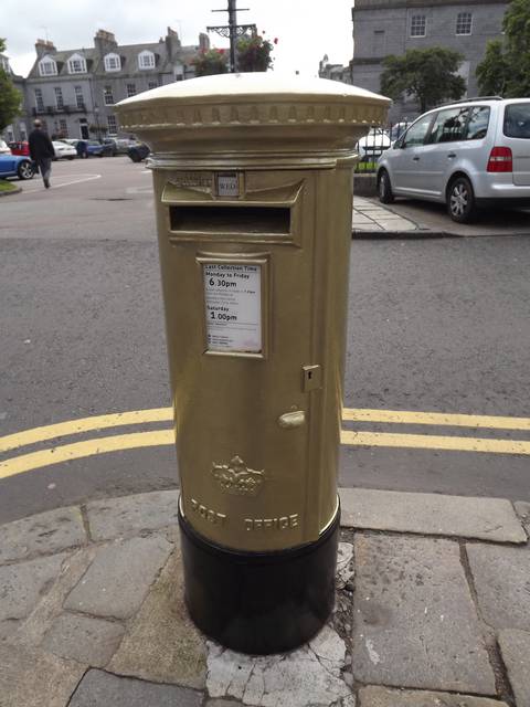 Golden Post Box commemorating cyclist Neil Fachie's victory at the London 2012 Paralympic Games