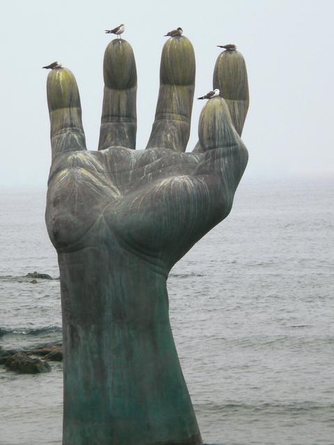 The Hand of Harmony at sunrise. This is the easternmost point of the country.