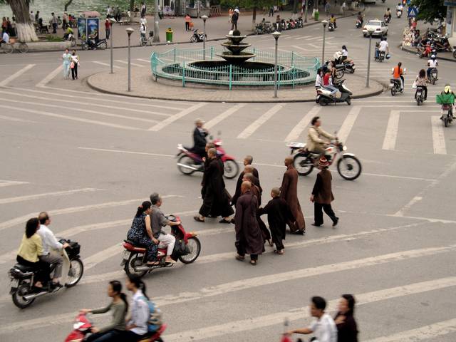 Monks crossing the street