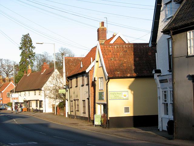 Houses and shops in The Street (A140)