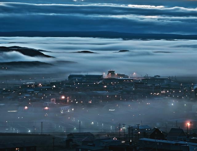 Enchanting night view of Iqaluit in September fog