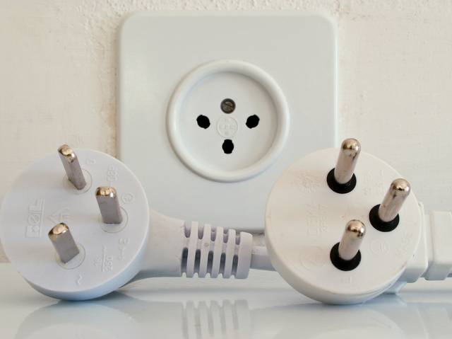 Israeli type plugs. Old type on the left, new type on the right, and a ubiquitous hybrid socket that also accepts type C plugs