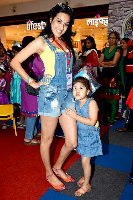 In bigger Indian cities, wearing of shorts by women is generally accepted. Picture shows an Indian woman with her daughter in Mumbai.