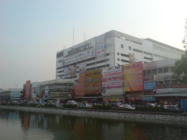 Like the base of some unfinished skyscraper, the monolithic hulk of the Klang Plaza department store dominates the central Korat skyline