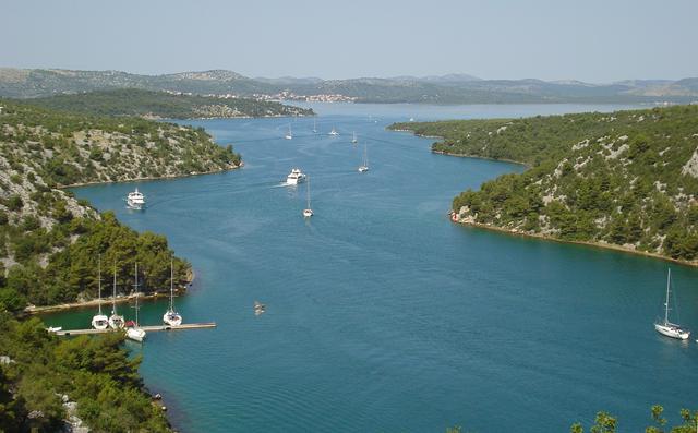 Yachts on the river Krka on their way towards Šibenik after visiting the park