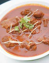 Laal-Maans, red mutton curry, is a spicy specialty of Rajasthan