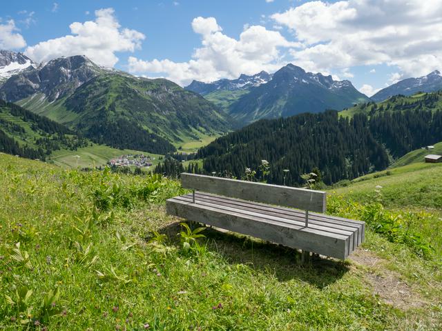 Bench on a hiking trail above Lech