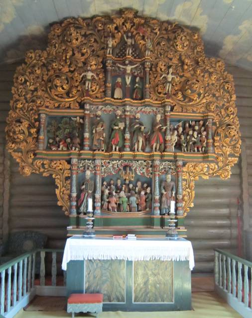 Elaborated wood carving by local master in Lesja church, about 1750.