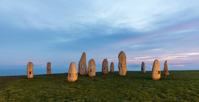 The Menhirs (Los Menhires) in Tower Park (Parque de La Torre); this 1994 group of sculptures is designed such that the holes in the rocks frame different views of the park and the bay through them