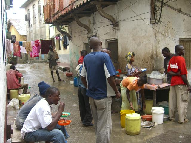 Locals eating street food in Mombasa