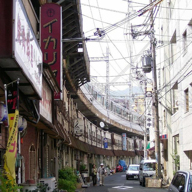 Motomachi: Many shops, bars, and other commercial establishments are below the train tracks in Kobe