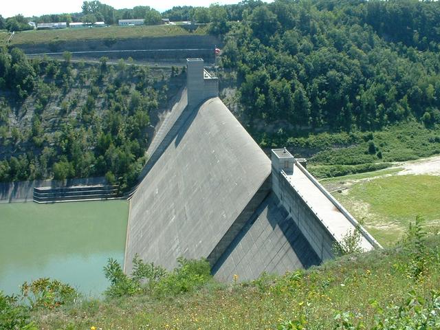 The Mount Morris Dam, looking south, with the visitors center in the background.