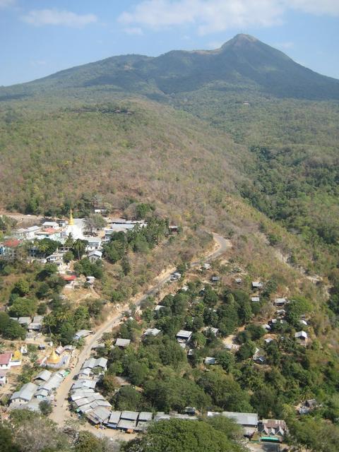 Mount Popa as seen from Popa Taungkalat Shrine, with the pilgrim village at the base of the shrine