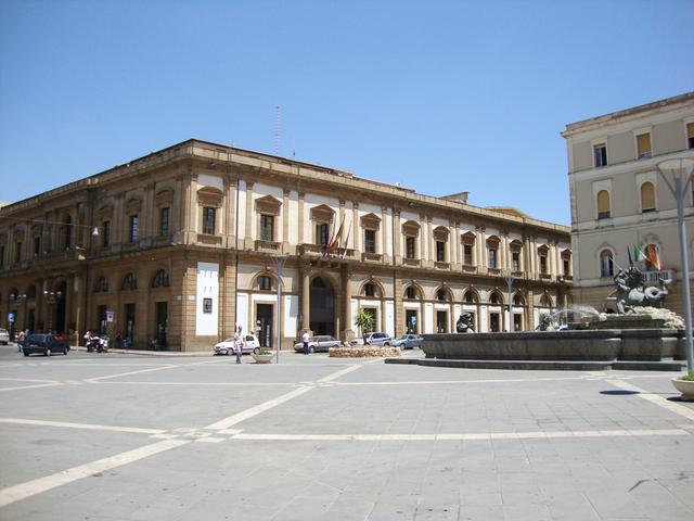 Piazza Garibaldi with the Fontana del Tritone and Palazzo del Carmine in the background.