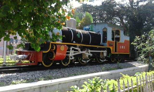 A steam engine on display at the Mysore railway station