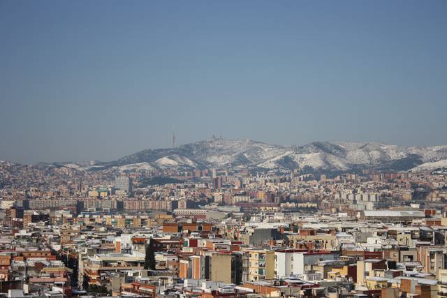 It rarely snows in Barcelona, but when it does it highlights the closeness of the mountain range at one end of the city to the seaside on the other