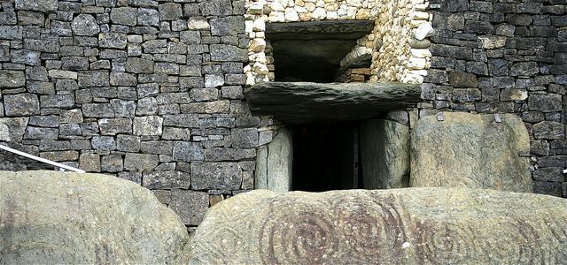 Entrance to the Megalithic Passage Tomb in the valley of the Boyne. The top entrance, or 'roof box' entrance, is for the sun