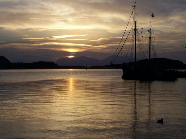 Sunset at Oban looking towards the islands of Kerrara and Mull