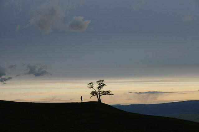 A lone soul in the sunset near the Shamanka rock