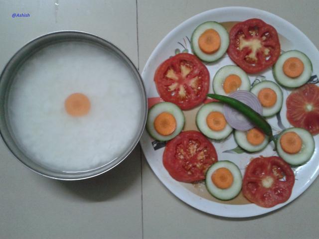 Pakhala is eaten in Sambalpur with cucumber, tomato, carrot and salad.